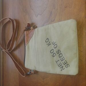Seed Passport bag with adjustable crossbody strap
